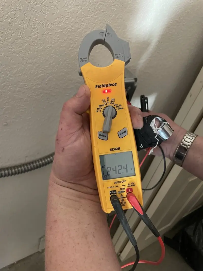 Voltage testing with clamp meter during Electrical Installation Services in Canyon Creek